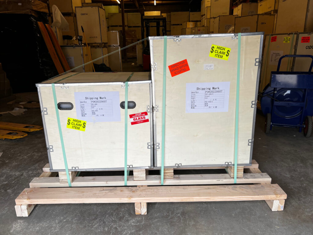 My new Cade 600 S2 reef tank in shipping crates with my name on them, waiting to ship from the Algae Barn warehouse.